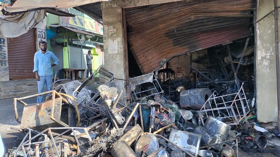 <div class="paragraphs"><p>A shop being torched during the riot at Nagamangala town, Mandya district.</p></div>